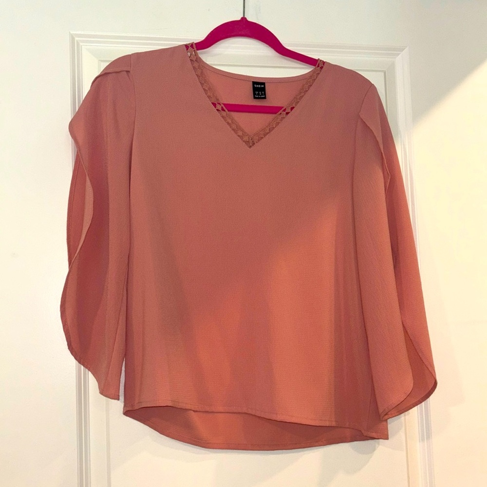 Pink long sleeve , slit on the sides of sleeves blouse